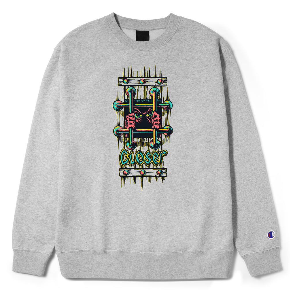 This CLOSER LUCERO BARS CREWNECK GREY sweatshirt features a vibrant green and yellow design, making it a stylish choice for anyone who loves the CLOSER RICK aesthetic.