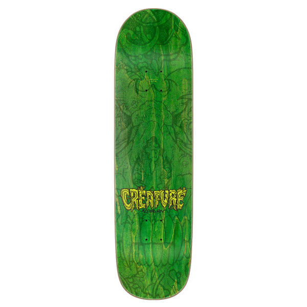 A green CREATURE DEMON SKULL EVERSLICK skateboard.