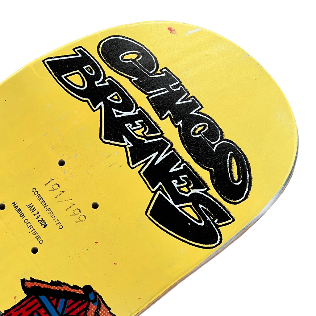 A close up of the name Chico Brenes and the printed specs of the deck underneath it.