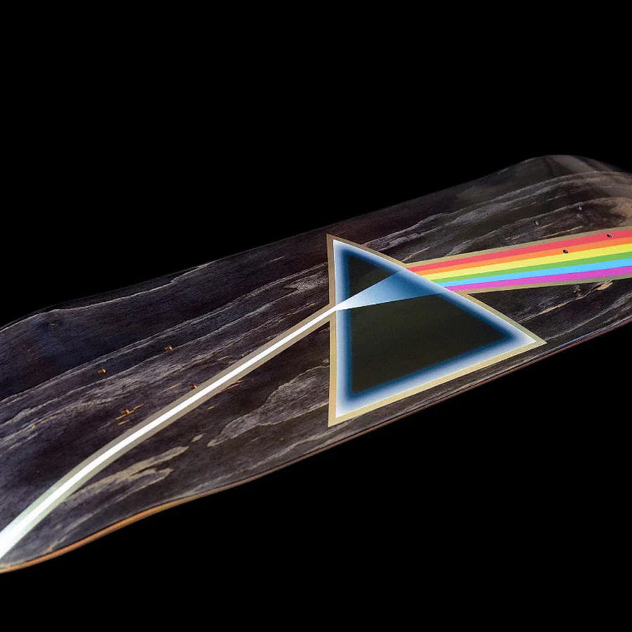 HABITAT X PINK FLOYD DARK SIDE OF THE MOON prism and spectrum graphic on an 8.25" skateboard deck against a black background by HABITAT.
