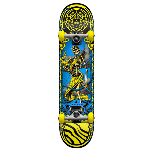 A DARKSTAR ARROW COMPLETE YELLOW skateboard with a skeleton on it.