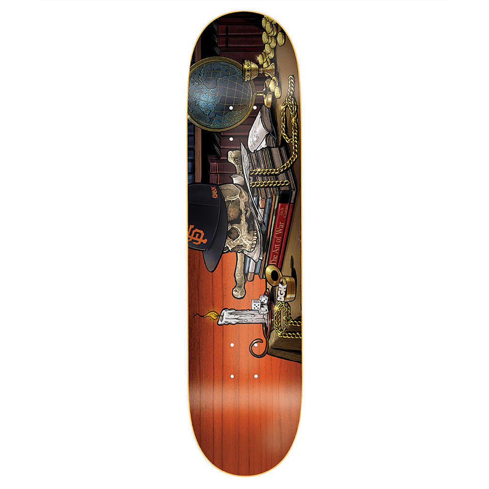 The DGK CURTIN LIFE TWIN TAIL skateboard deck by DGK features a still life graphic with a skull, books, candle, gold chains, globe, and black cap on a wood-grain background.
