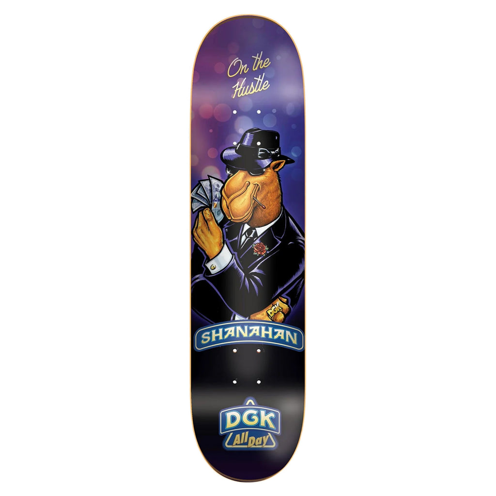 The DGK SHANAHAN SMOOTH skateboard deck features a camel in a suit holding cards, adorned with the phrases "On the Hustle," "Shanahan," and "DGK All Day." Perfect for riders who embrace both style and strategy, it's truly a CURTIN BILLIONS masterpiece.