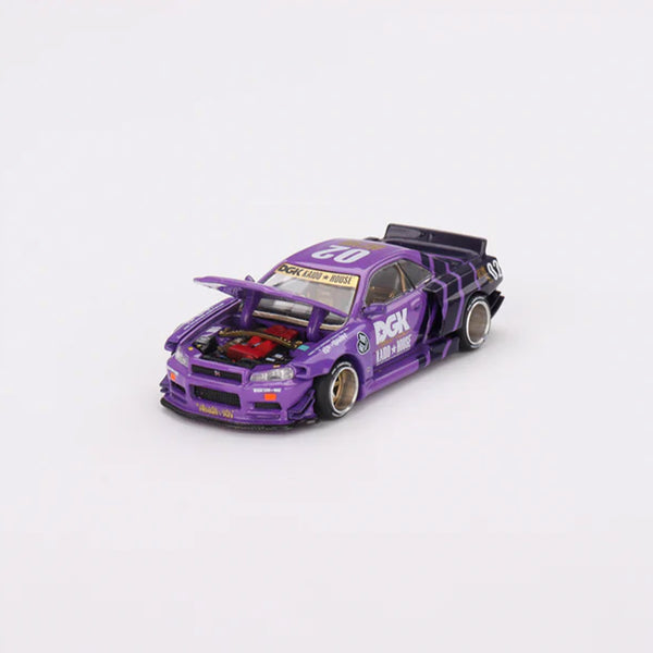 A DGK x KAIDO HOUSE DIECAST MODEL by BAKER, showcasing a purple racing car with an open hood and detailed decals, sits on a plain white background, echoing the sleek design of Chocolate Skateboards.