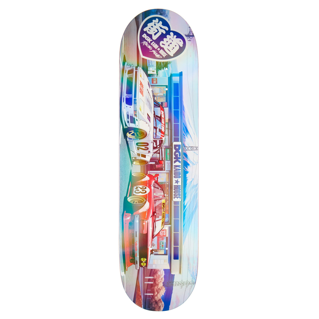 The 8.25" DGK x Kaido House Konbini Holographic Multicolor skateboard deck features vibrant illustrations of buses, a sports car, and a cityscape with Japanese text, alongside exquisite Zokusha Rainbow Glitter for an eye-catching finish.