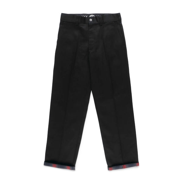 The DICKIES X SPITFIRE Flannel Cuff Pants in black twill come with pleats, belt loops, and a button closure. Set against a white background, they offer a wrinkle-resistant design and stain-release finish for easy style and upkeep.