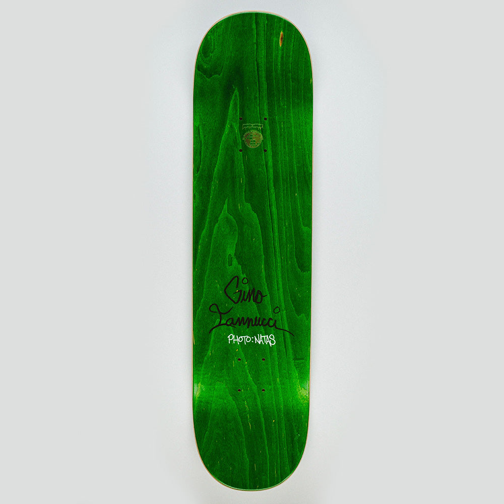 The FUCKING AWESOME GINO 1993 skateboard deck features a green wood grain finish, black signature, and “PHOTO-NY03” text on the bottom half.