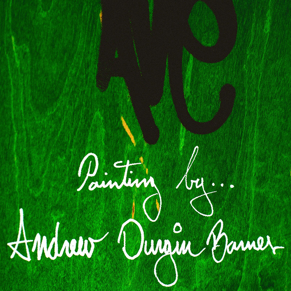 White handwritten text on a green textured background reads: "Painting by... Andrew Durgin-Barnes" in bold black letters, matching the vibe of a FUCKING AWESOME AVE WOMAN WITH SNAKE skateboard by FUCKING AWESOME, its original shaped board partly visible at the top.