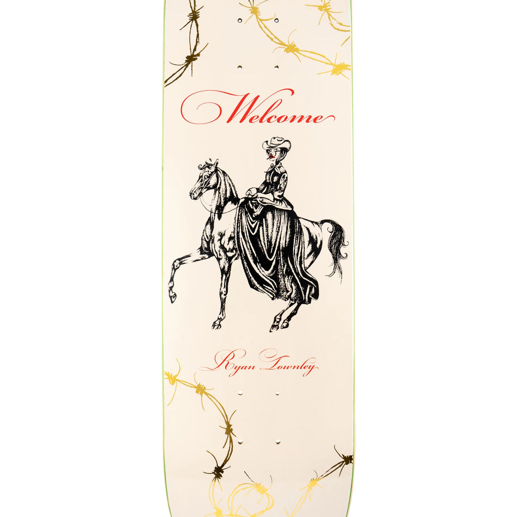 A WELCOME skateboard with a prismatic foil image of a woman riding a horse.