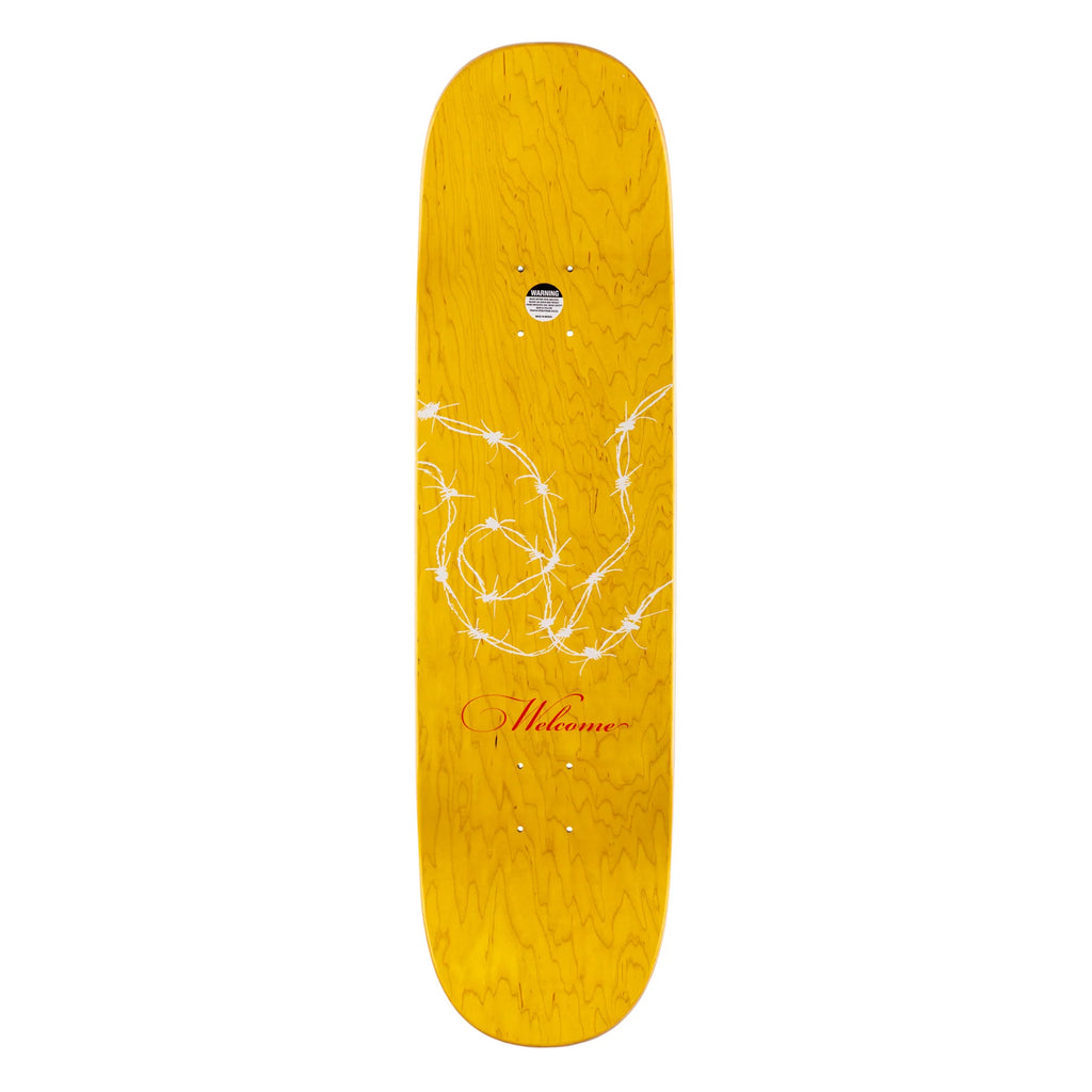 A yellow WELCOME skateboard with a prismatic foil design on it.