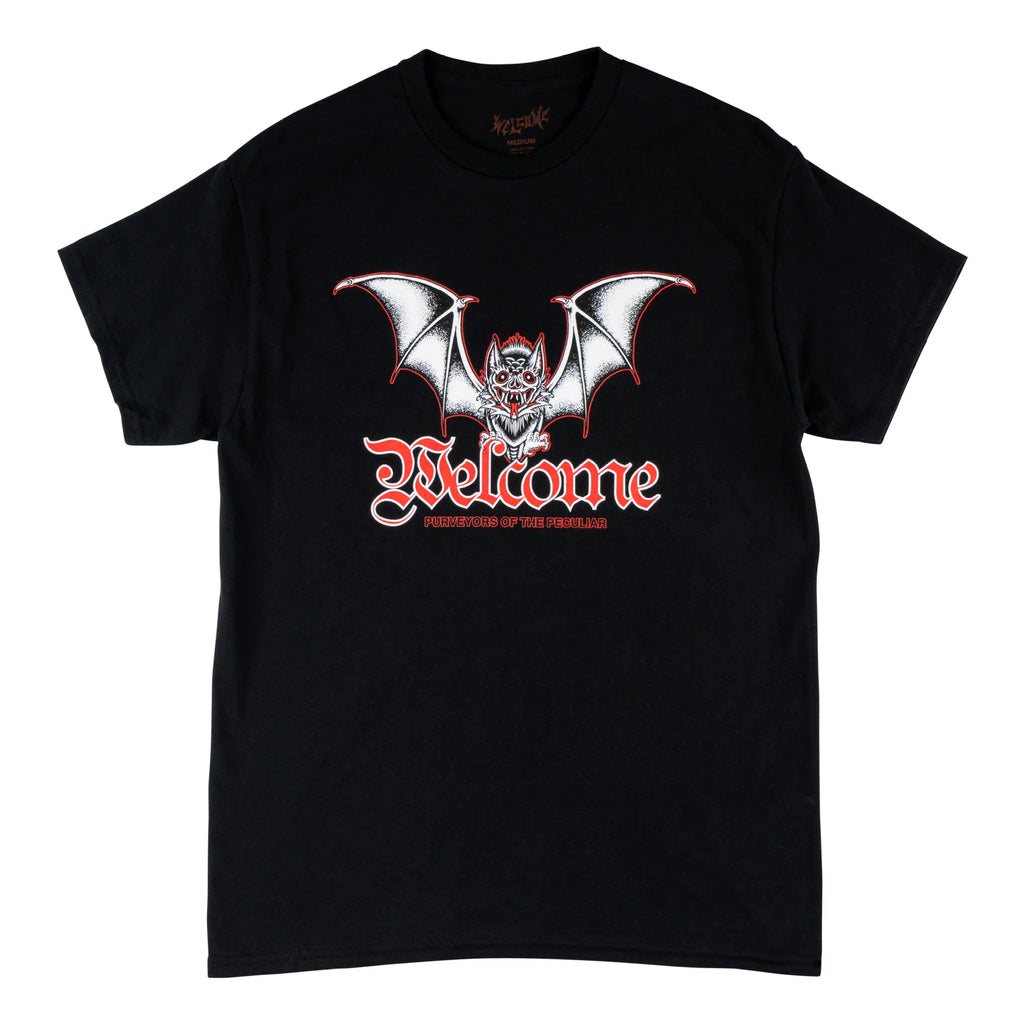 A WELCOME black t-shirt with a bat on it.