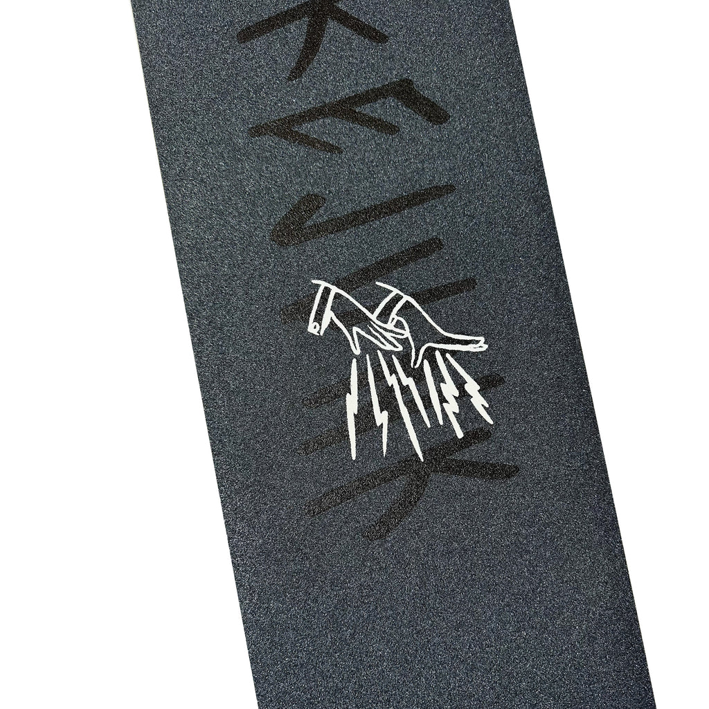 The FAKE JUNK GRIPTAPE STACKED LOGO features silicon-carbide skateboard grip tape with a bold white hands-and-volcano graphic and stylized black text.