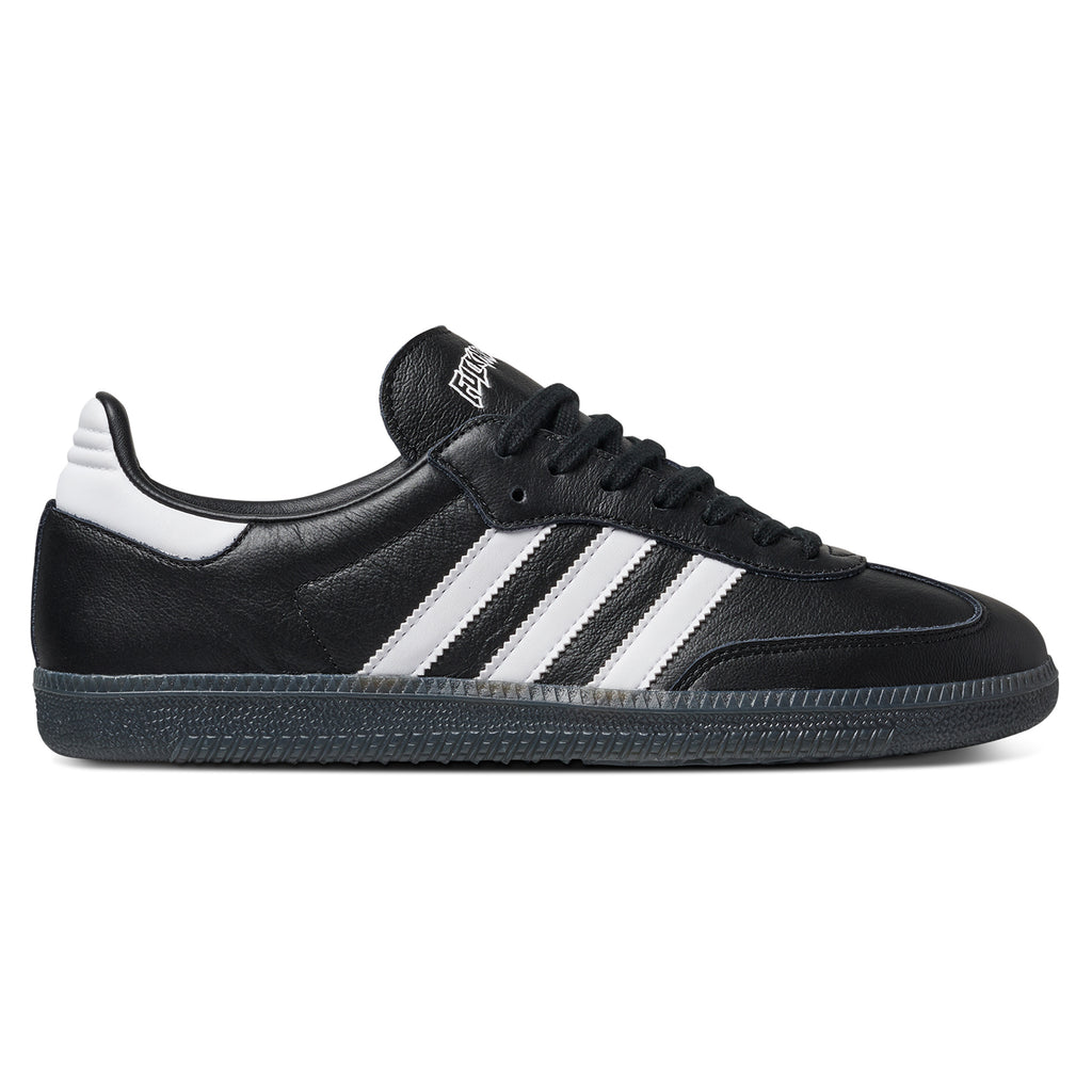 A black and white ADIDAS X FUCKING AWESOME SAMBA BLACK / BLACK / WHITE shoe made of patent leather material.