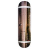 An artful skateboard featuring FUCKING AWESOME DYLAN PHOTO BY DILL's picture and various stains.