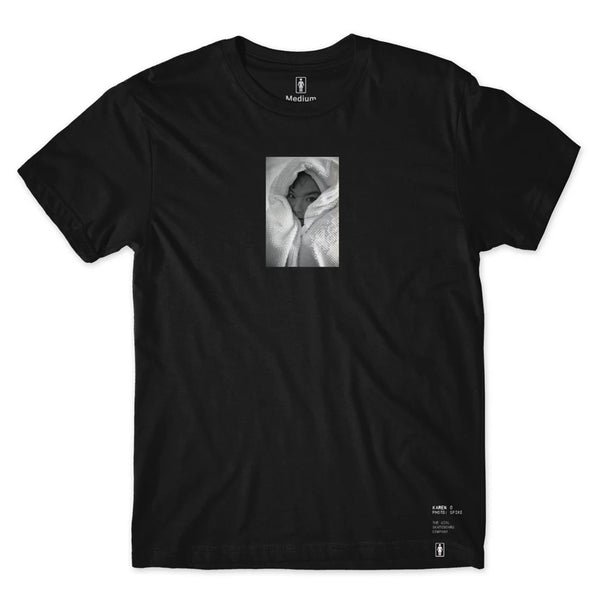 Black GIRL SPIKE JONZE BJORK PHOTO TEE BLACK by CRAILTAP with a small rectangular image of a person wrapped in a blanket near the center. Text labels "Medium" and "100% Cotton" highlight its comfort, while the modern classic fit ensures style.