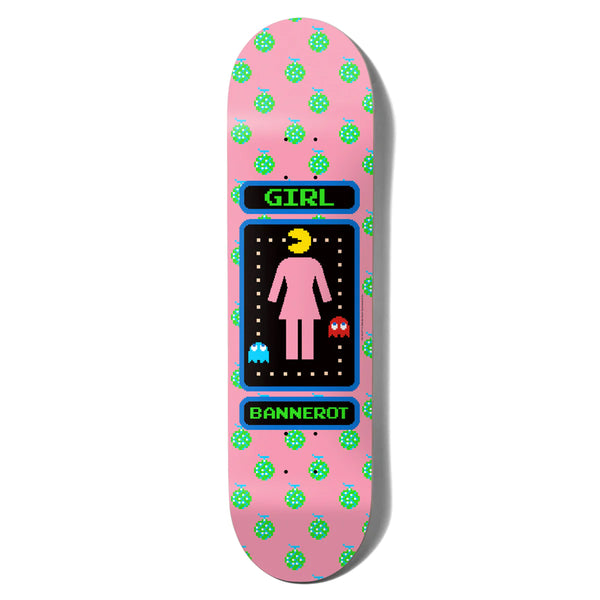 The GIRL X Pac-Man Bannerot skateboard from the GIRL brand showcases a pink deck adorned with a playful green frog design. The Pac-Man-themed artwork features a central female icon, the Pac-Man figure, and two ghosts. The text "GIRL" is displayed at the top, "BANNEROT" is at the bottom, and "GEERING" accompanies it on the deck.