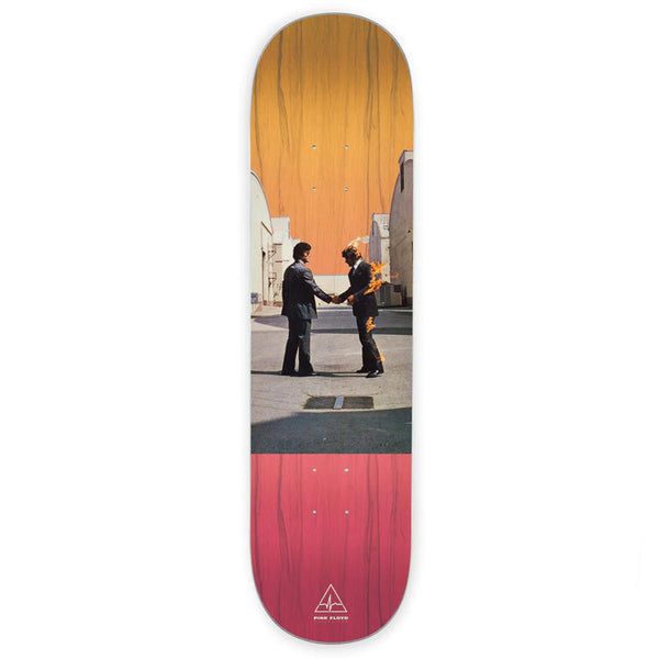 A HABITAT X PINK FLOYD WISH YOU WERE HERE skateboard deck with a graphic of a person on fire being confronted by a police officer, themed around HABITAT X PINK FLOYD's DARK SIDE OF THE MOON.