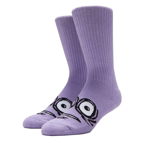 eyes and mouth image weaved into top of foot