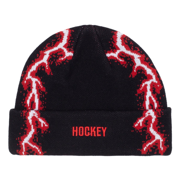 A black knit beanie with red and white lightning bolts on the sides and the word "hockey" embroidered in red.