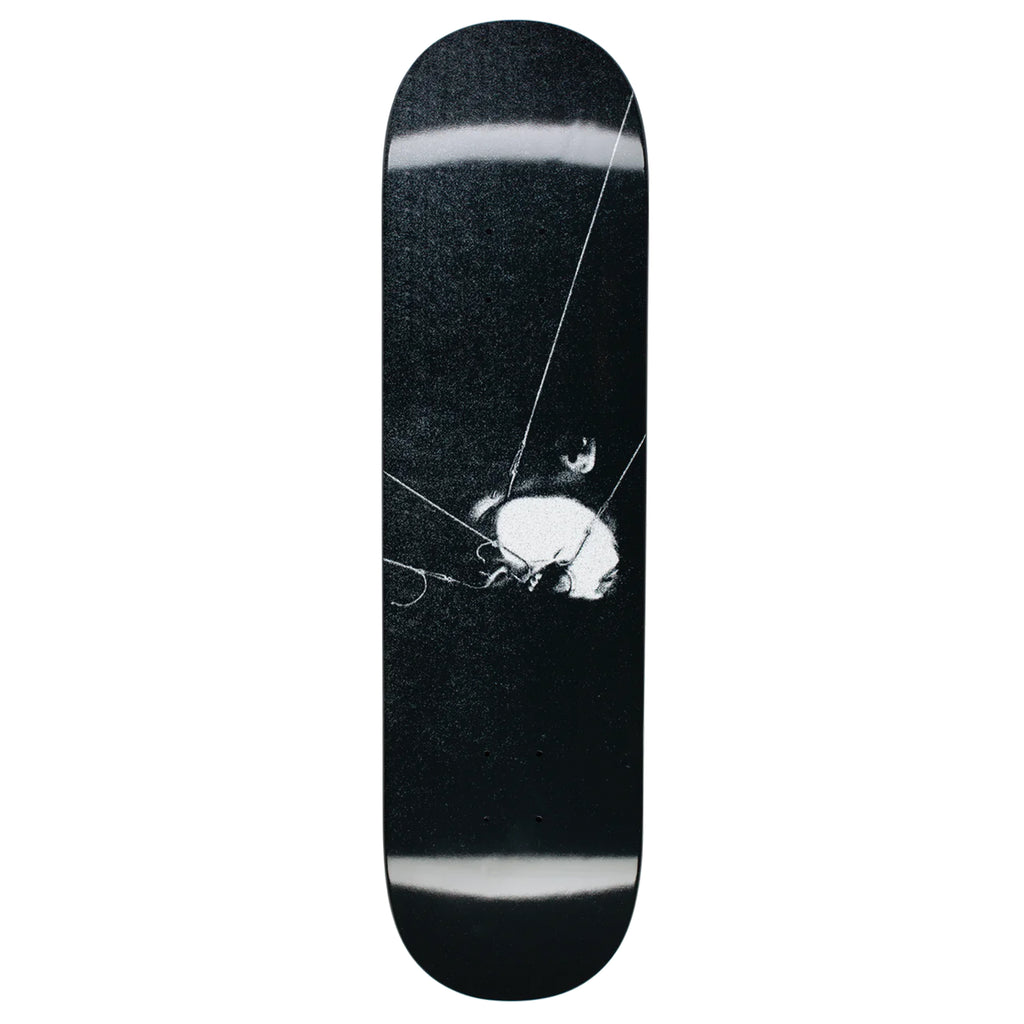 A HOCKEY skateboard with a black and white image on it.