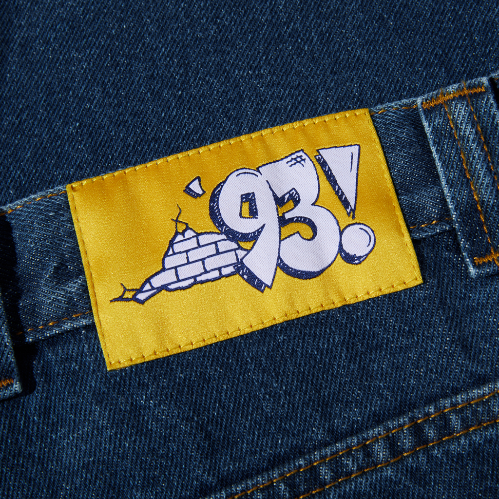 A patch of POLAR '93! DENIM DARK BLUE on the back of a pair of jeans from POLAR.