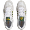A pair of white and green ADIDAS FORUM 84 LOW ADV WHITE / DARK GREEN / YELLOW sneakers.