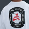 The NIKE SB Paul Rodriguez Max90 Skate Tee in white features a back badge with “Paul Rodriguez Skateboard Excellence,” “NIKE SB,” and “Celebrating 20 Years” plus a red crown and swoosh, all on soft midweight cotton.