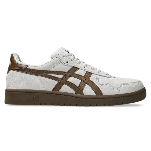 The ASICS JAPAN PRO in Cloud Grey/Brown Storm features white suede with brown leather accents, suede paneling, and a brown rubber sole, shown from the side.