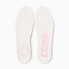 A pair of CONVERSE x TURNSTILE ONE STAR PRO OX WHITE / PINK insoles on a white surface.
