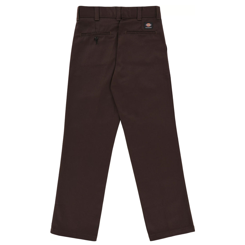 A pair of Dickies Jamie Foy Loose Fit Straight Leg Pants in Dark Brown, featuring a loose fit with belt loops and a rear pocket. Crafted from brushed twill fabrication, they also showcase a small rectangular logo label near the waistband.