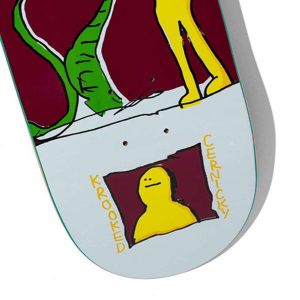 A KROOKED CERNICKY TALL SNAKE skateboard featuring a sparkly illustration that embodies the unique style of skateboard artist Cromer Unicycle.