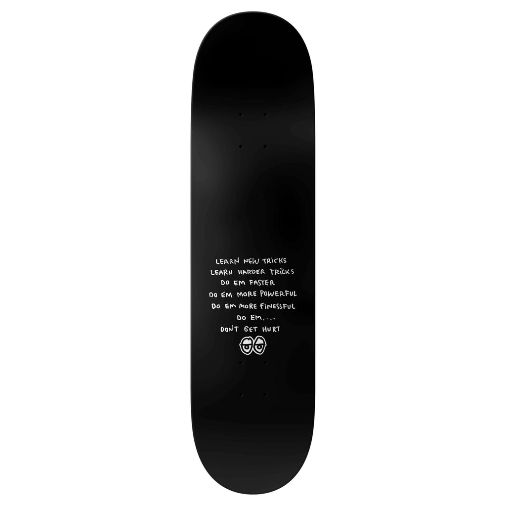 A black KROOKED CROMER MAD KING skateboard deck (8.06") by KROOKED features white text in the center—"Learn new tricks, learn harder tricks, do em faster..."—above two smiling faces.
