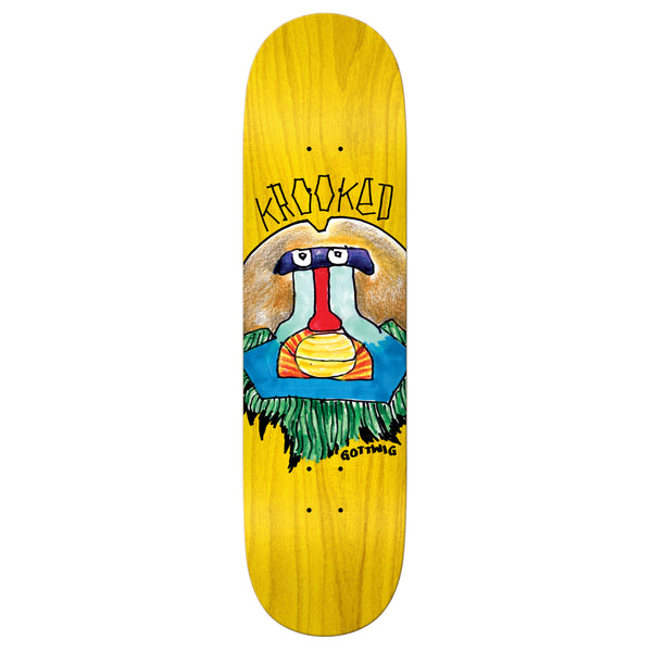 A yellow KROOKED GOTTWIG PRIMATE skateboard with a dog image by DELUXE.
