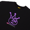 Carpet Co. "Kid" Tee Black featuring a purple crown and face logo with the text "brat. rulè by Carpet Co." on the front.