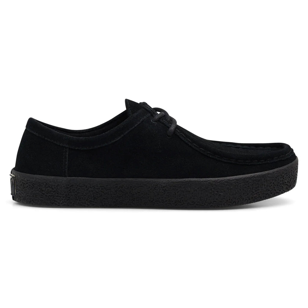 The LAST RESORT AB VM006 MOC BLACK / BLACK by Last Resort AB is a black suede shoe with a textured rubber sole, simple lace-up design, and low-profile silhouette.