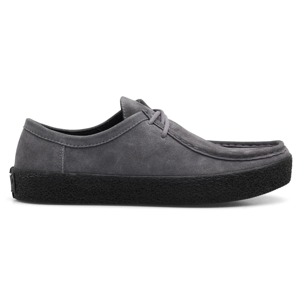 The LAST RESORT AB VM006 MOC STEEL GREY / BLACK by Last Resort AB features a gray suede exterior with a casual design, complemented by a rounded toe, black textured sole, and thin laces. Its matte finish and low-rise profile provide a sleek appearance.