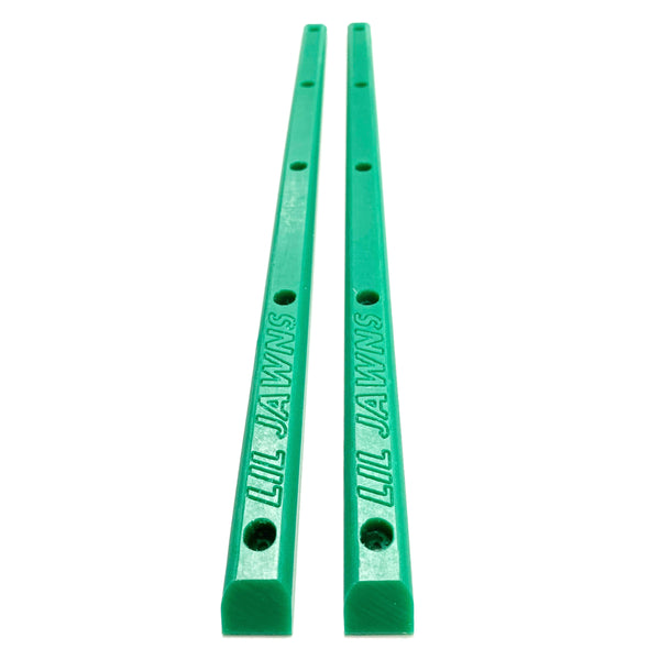 A pair of green skateboard rails with 5 holes each.
