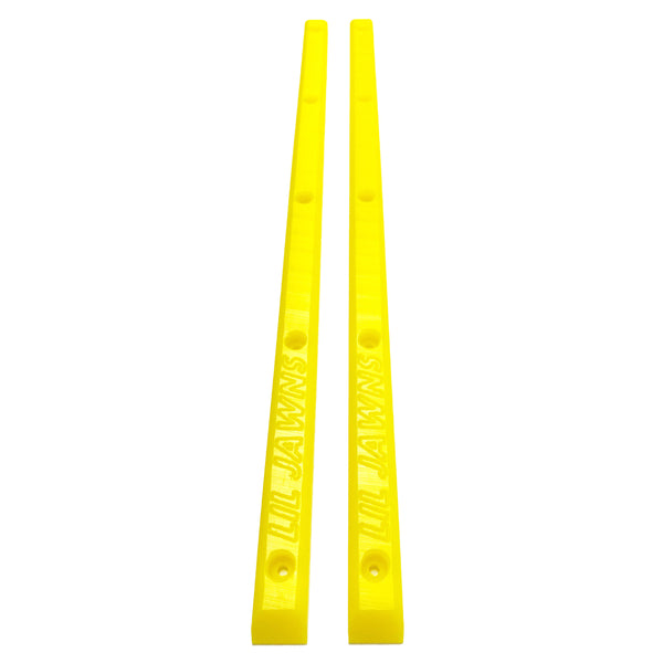 A pair of yellow skateboard rails with 5 holes each.
