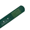 A green, textured croc skin LOOSEY CROC SKIN BELT GREEN by Loosey with two holes and an embossed logo near the end.