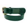 A LOOSEY CROC SKIN BELT GREEN by Loosey, coiled in a circular shape.