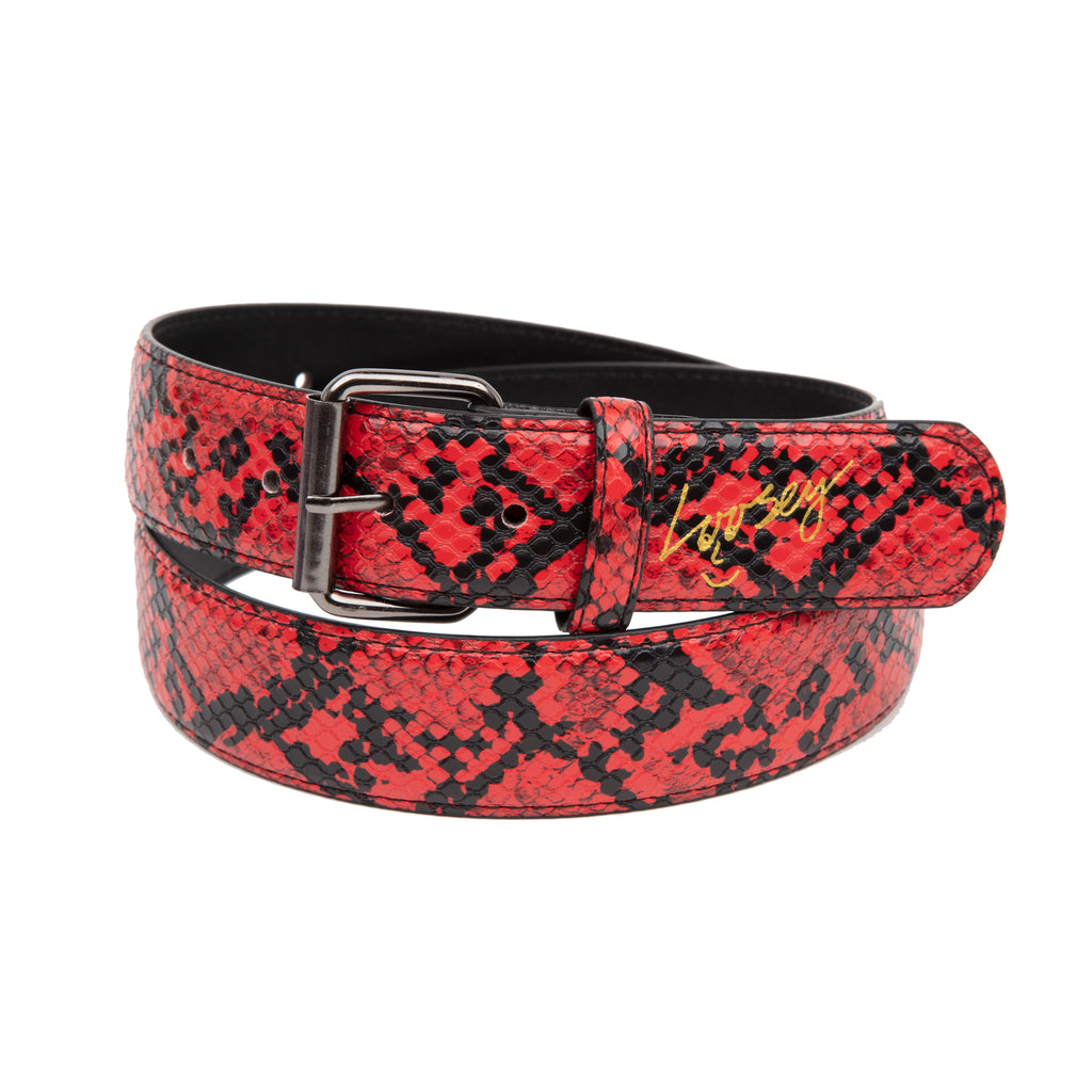 A Loosey Slither red belt with a buckle. The belt features an embossed Loosey logo, adding an extra touch of style to its navy faux leather design. Perfect for those looking to make a fashion statement.