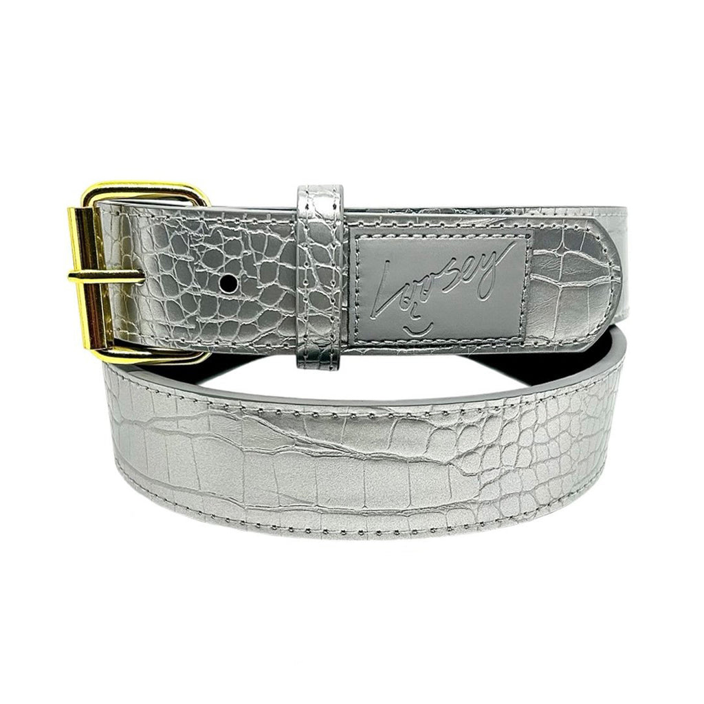 Loosey LOOSEY CROC SKIN BELT SILVER featuring a silver faux croc skin design, gold buckle, and an engraved logo on the label.
