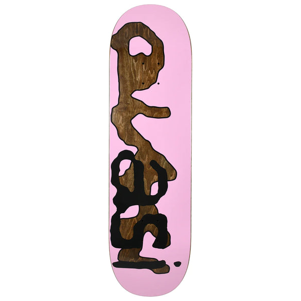A QUASI LOWERCASE PINK skateboard with quasi black writing on it.