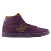 A purple high top shoe with a purple sole and yellow details on the side and inside.