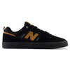 The NB NUMERIC FOY 306 BLACK / BROWN is a low-top skate shoe by NB NUMERIC, featuring a black upper, gum-colored "N" logo and accents, black sole, and vulcanized construction inspired by Jamie Foy.