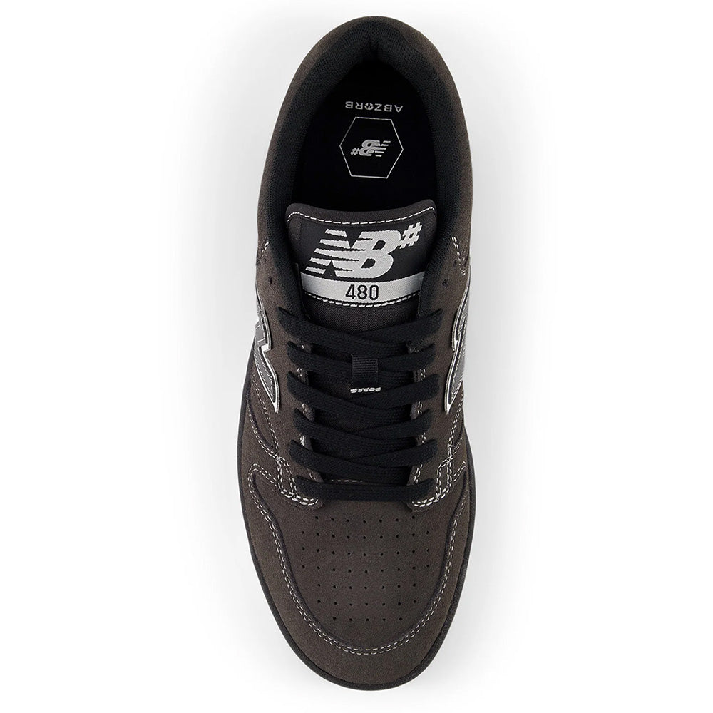 A top view of the NB NUMERIC 480 BLACK CEMENT / WHITE sneaker with white stitching, perforated toe box, and NB 480 logo on the tongue—crafted by NB NUMERIC and inspired by classic hightop basketball shoes.