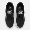 A pair of NB NUMERIC 480 "YIN" BLACK / SEA SALT sneakers on a white background.