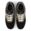 A pair of NB NUMERIC REYNOLDS 933 sneakers in black and dark olivine by NB NUMERIC, shown from above with white laces, a gray inner lining, and a comfortable ABZORB in-sole.