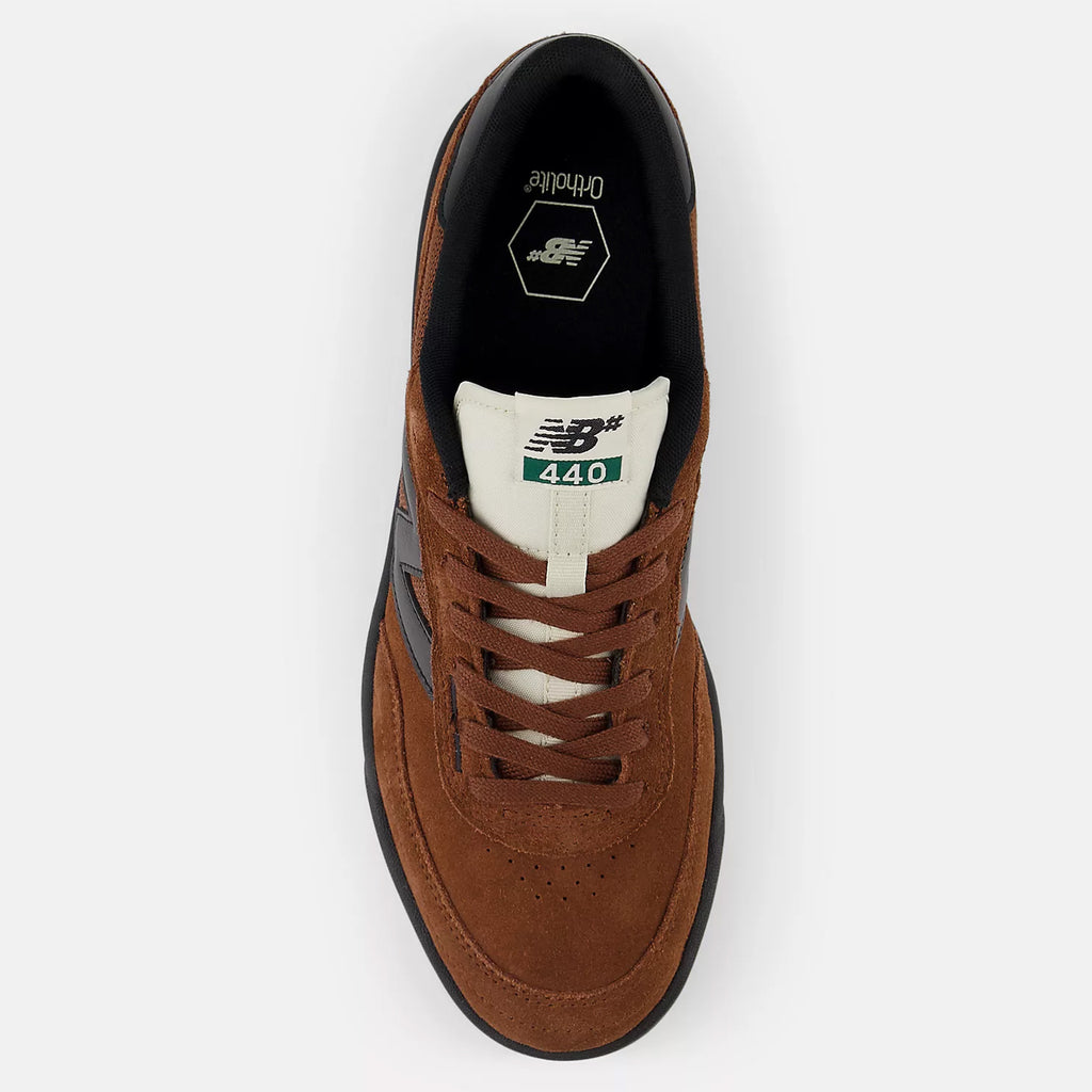 Top view of a NB NUMERIC 440 V2 sneaker in brown with a white tongue and black accents, a versatile cupsole skate shoe ideal for the everyday skater, presented on a plain background.