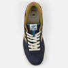 Top view of an NB Numeric 440 V2 Eclipse / Great Plains skate shoe from the NB Numeric line in navy and beige, featuring white laces and a logo on the tongue.